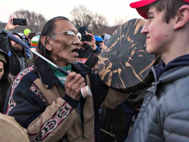 Nick-Sandmann and Nathan Phillips