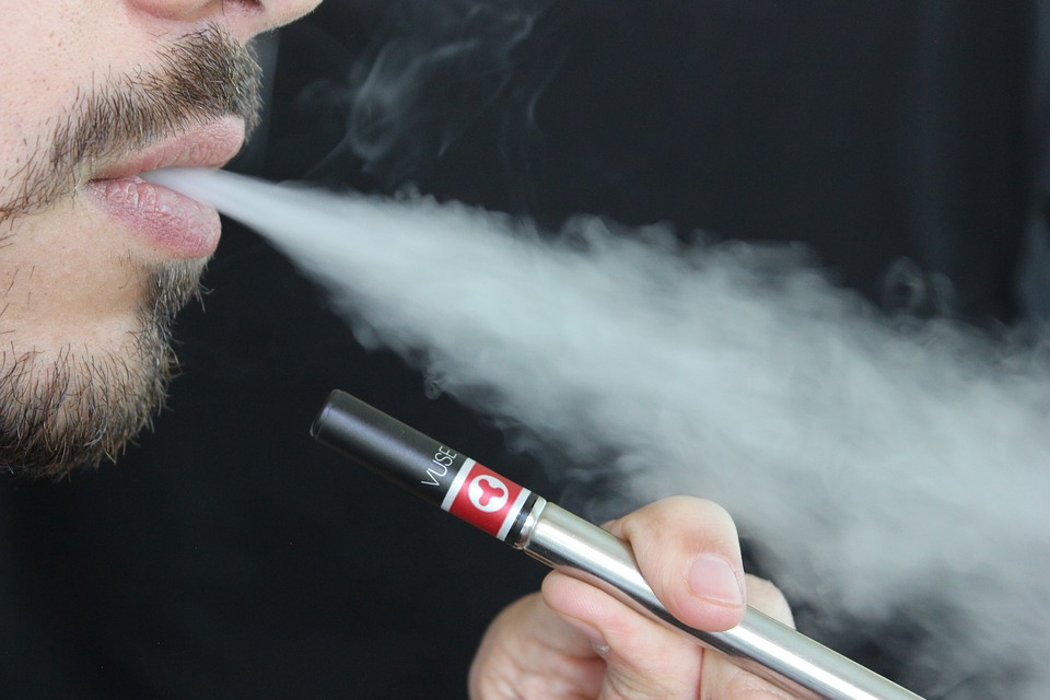 Vaping e-cigarettes