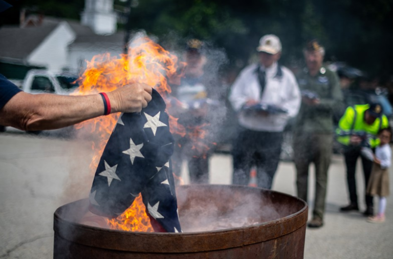 MLT Cover photo - burning a flag