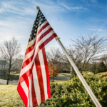 American Flag pole porch neighborhood