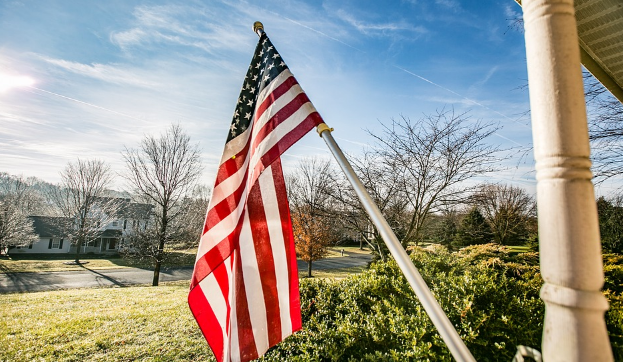 American Flag pole porch neighborhood
