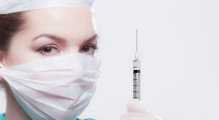 Vaccine woman nurse doctor hypdermic