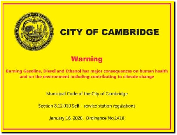 Cambridge Mass Warning Stickers on Fuel Pumps