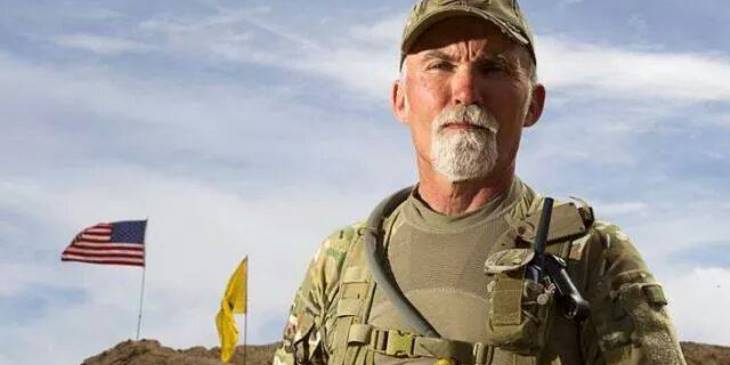 Delemus flag uniform Bundy Ranch