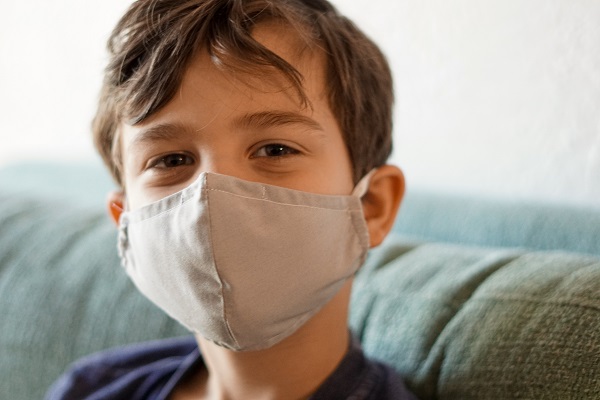 Child boy student cloth mask Photo by Izzy Park on Unsplash