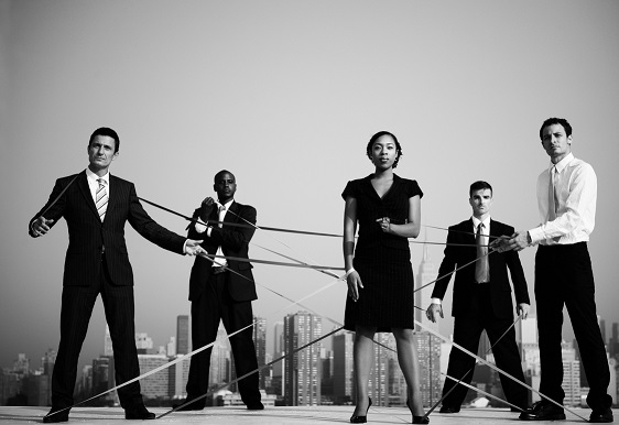 Strings attached Business People Connected By Strings