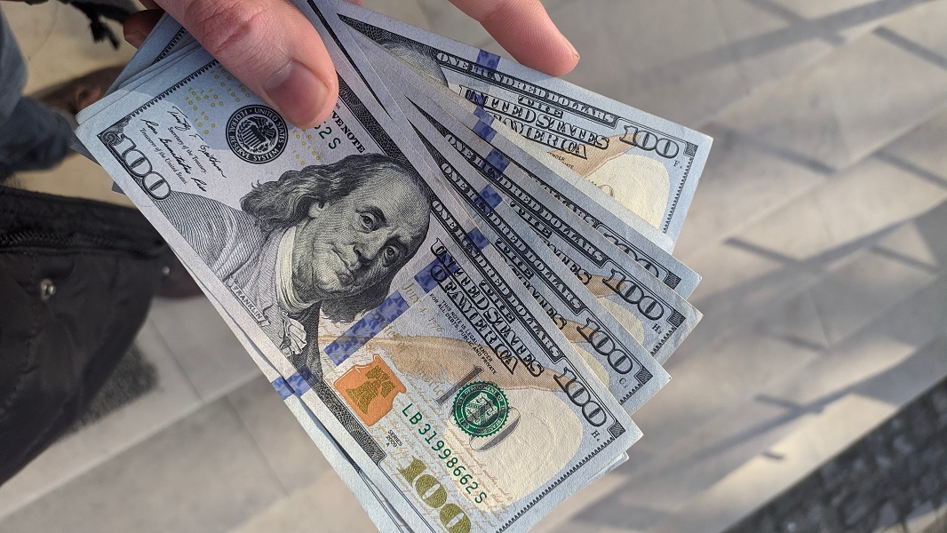 Money US dollars benjamins Orignal Photo by Frederick Warren on Unsplash