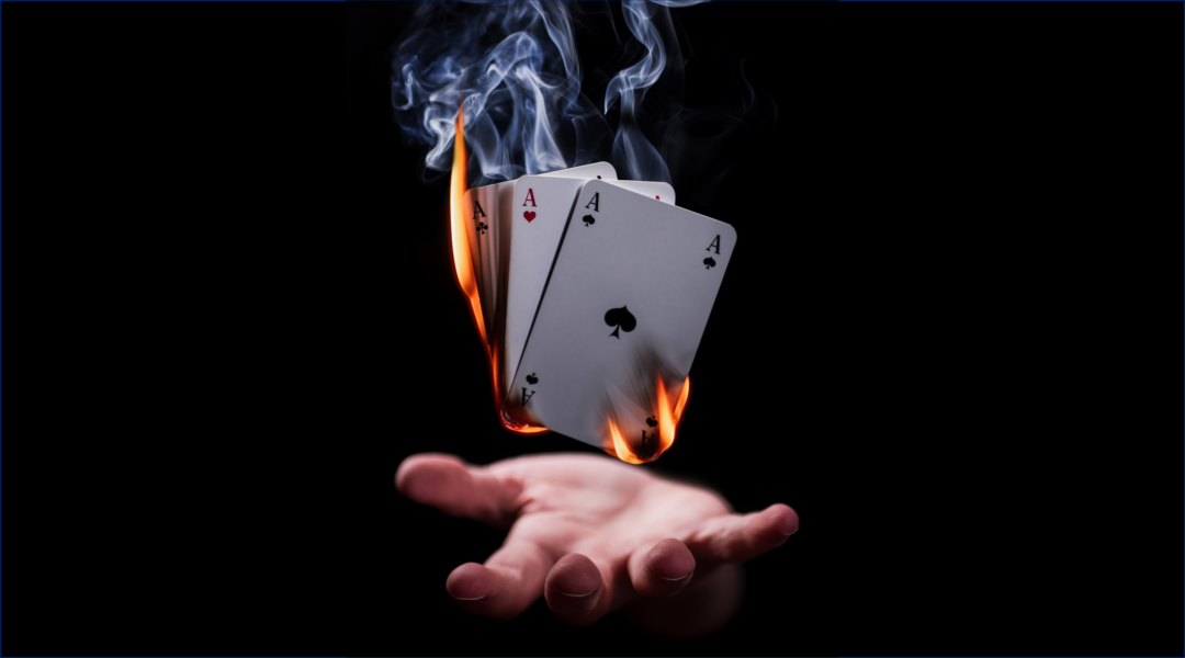 Magic hand cards flame original image Julius Drost on Unsplash
