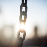Chains links sunlight