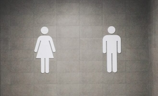 Men women bathroom symbols original Photo by Juan Marin on Unsplash