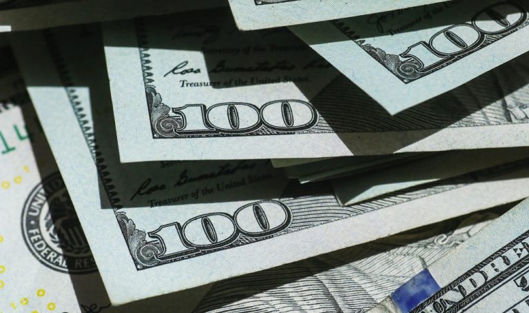 money cash hundred dollar bills original Photo by Giorgio Trovato on Unsplash