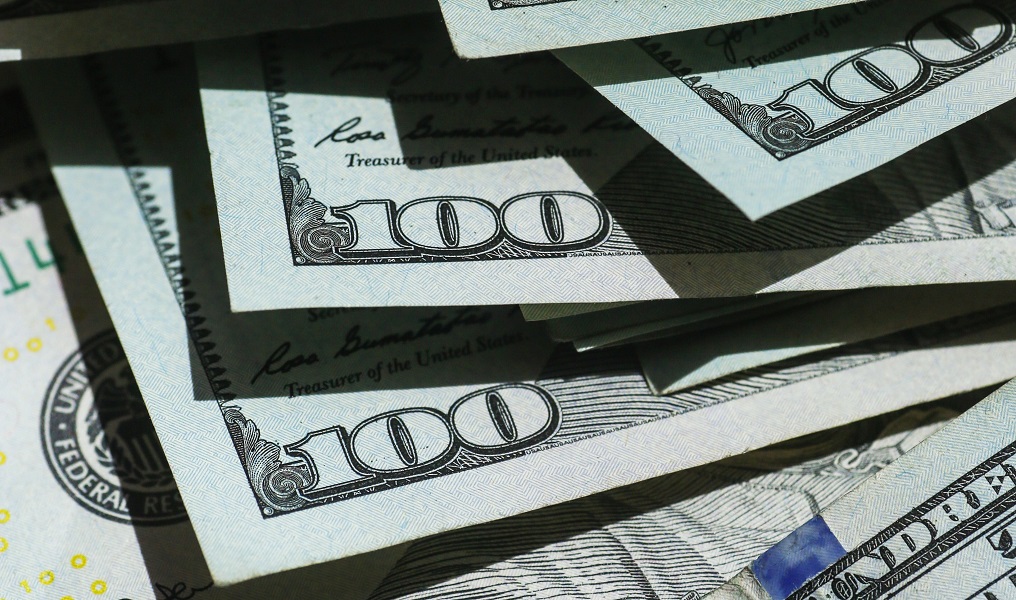 money cash hundred dollar bills original Photo by Giorgio Trovato on Unsplash