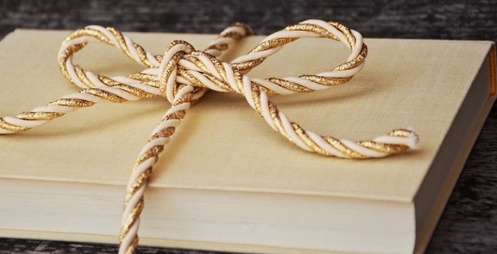 Gold wrapped present pixabay 1667826