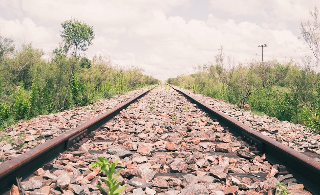 Railroad rails commuter rail original Photo by Gonzalo Facello on Unsplash