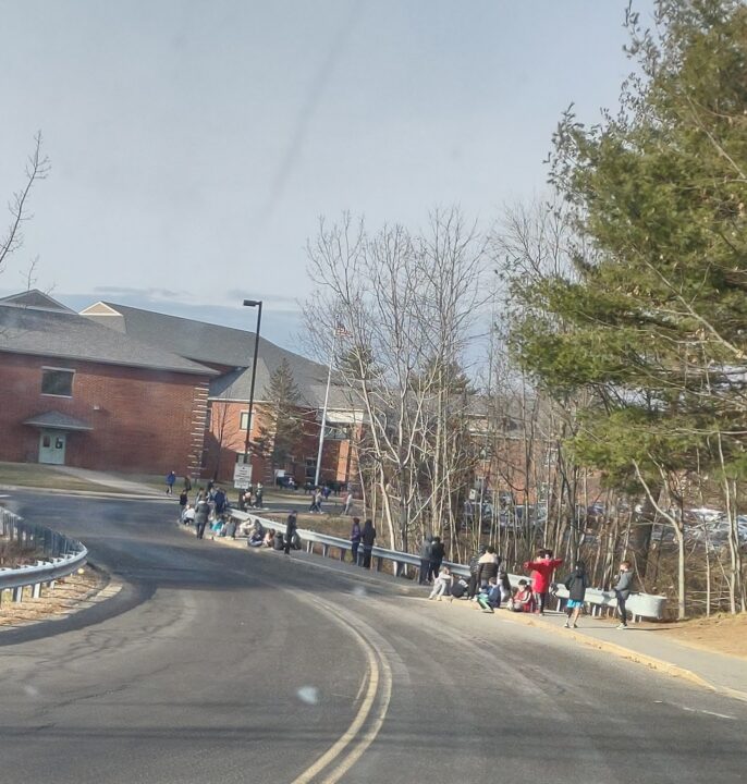 Dover schools kids out by the road kicked out of the cafateria