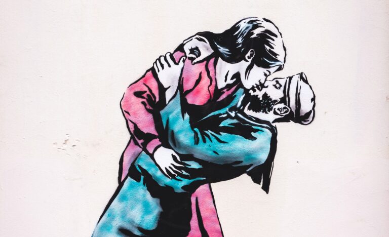 Drawing woman sailor kissing original Photo by Crawford Jolly on Unsplash