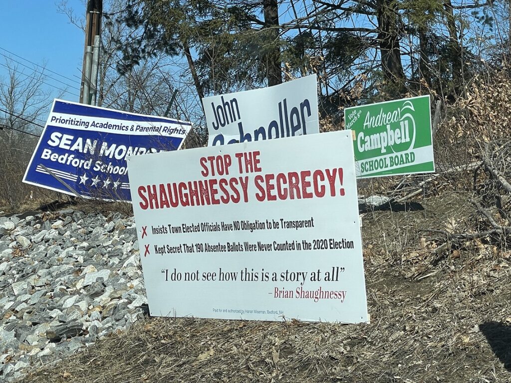 Hanan Wiseman Write In campaign sign for Bedford Moderator against Brian Shaughnessy