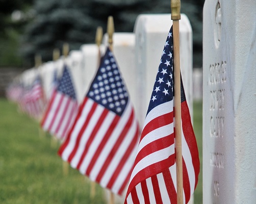 Memorial day flags grave stones