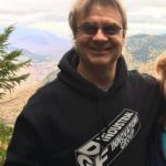 Doug with hoodie on FB page 1 cropped FI