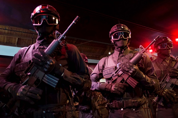 Police Armed Full gear bret-kavanaugh-TQuQh4xxPJg-unsplash