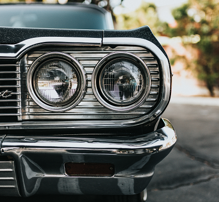 Classic car headlight original Photo by Nathan Dumlao on Unsplash