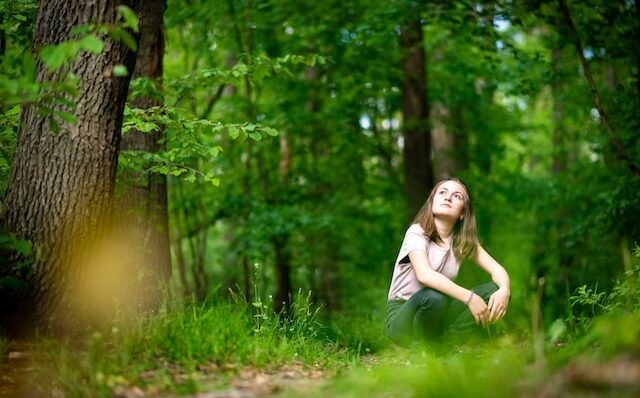 girl woman trees forest Photo by Michal Vrba on Unsplash