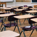 classroom empty desks original Image by WOKANDAPIX from Pixabay