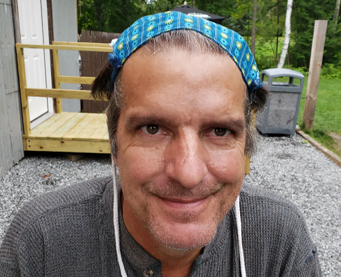 John Klar demonstrates proper use of facemask