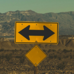 road sign arrows right or left original Photo by Pablo García Saldaña on Unsplash