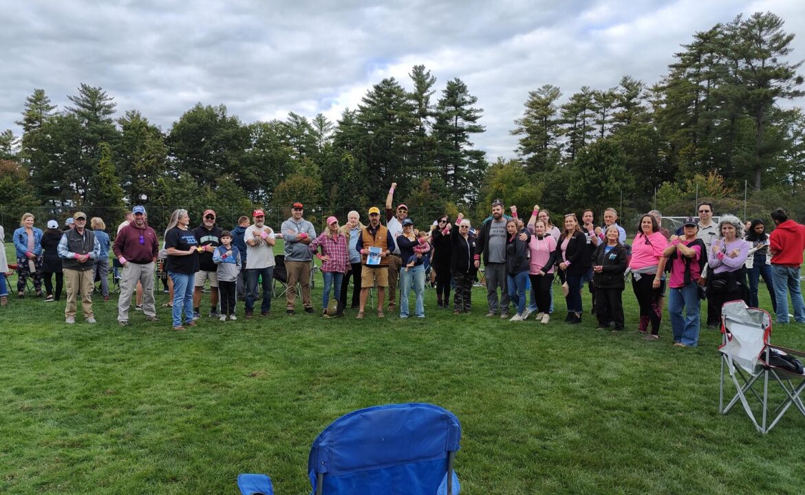 Parents pink writsbands and bow
