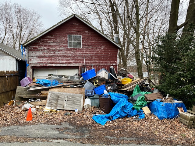 Barn garage pile of junk photo by lance-grandahl-VSXT9AV19Is-unsplash