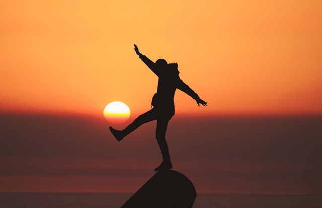 sunset rock balance photo by aziz-acharki-unsplash