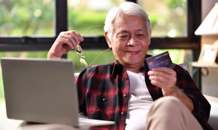 Man laptop credit card