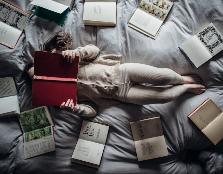 girl reading surrounded by books