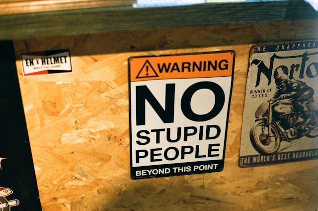 No stupid people sign