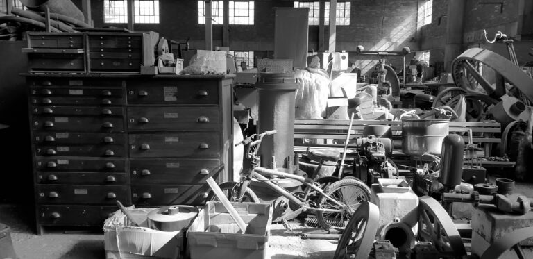 a black and white photo of assorted junk