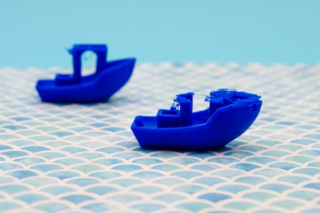 blue toy boat game pieces