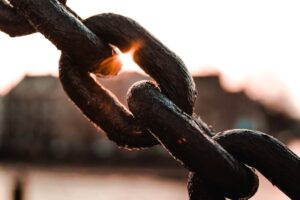 chain link in front of the sun
