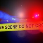 police car emergency lights crime scene tape