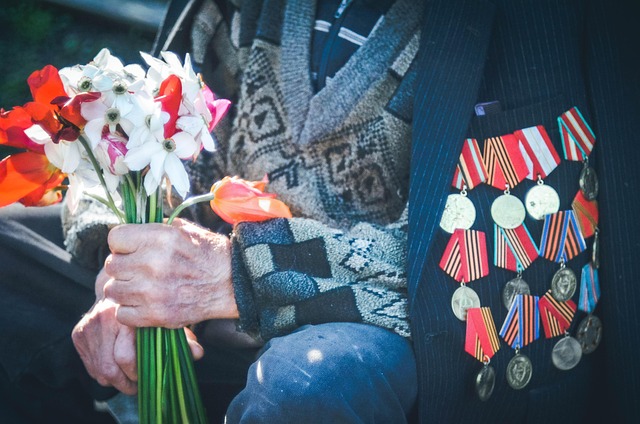 grandpa is a veteran flowers and war medals