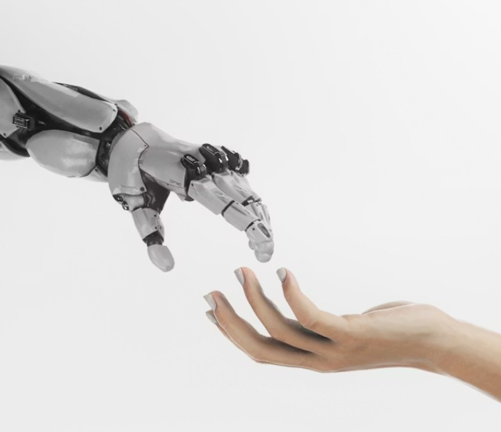 robot arm womens arm hands reaching for each other