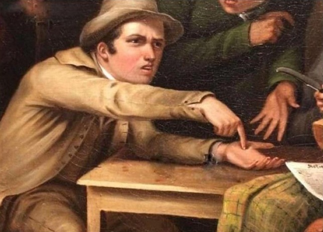angry man pointing at his hand