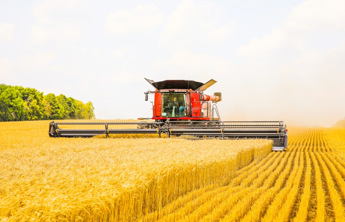 farm equipment grain crop harvester - unsplash