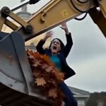 AI Image Becca Balint in a Loader getting dumped in the trash