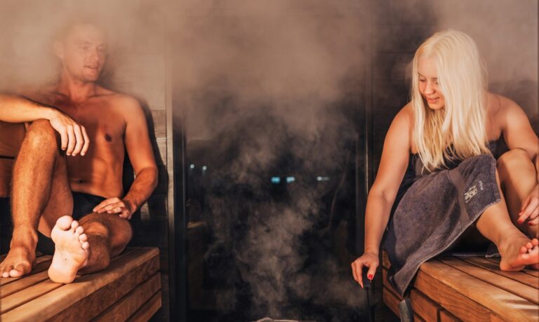 couple in an outdoor sauna