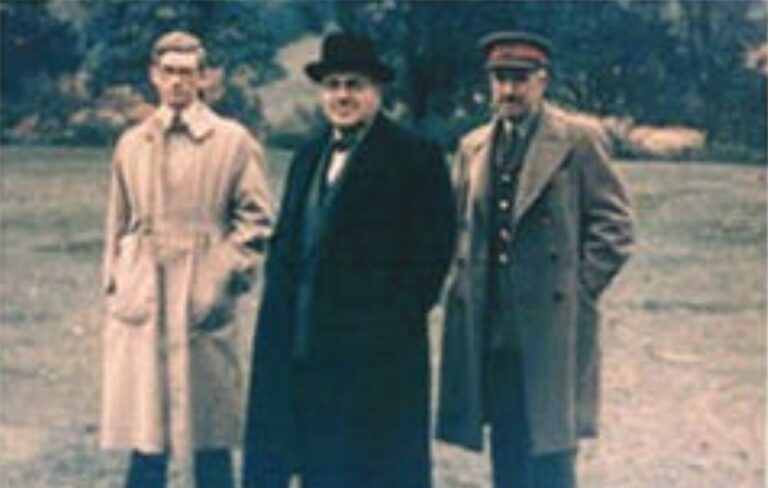 Photo of Harry Hinsley (far left) and two fellow cryptoanalysts in 1945. NationalArchives. gov.uk