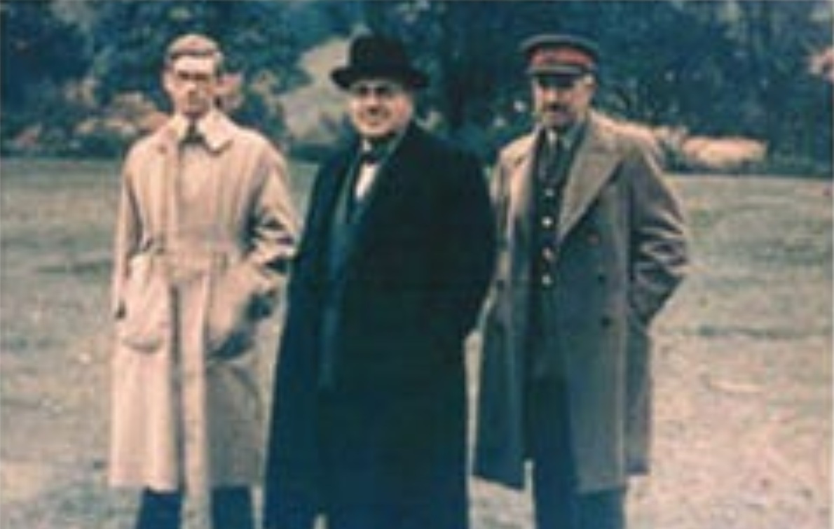 Photo of Harry Hinsley (far left) and two fellow cryptoanalysts in 1945. NationalArchives. gov.uk