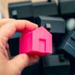 bin full of houses black and pink homes