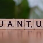 scrabble tiles spell out quamtum