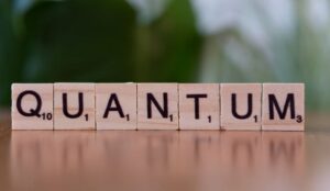 scrabble tiles spell out quamtum